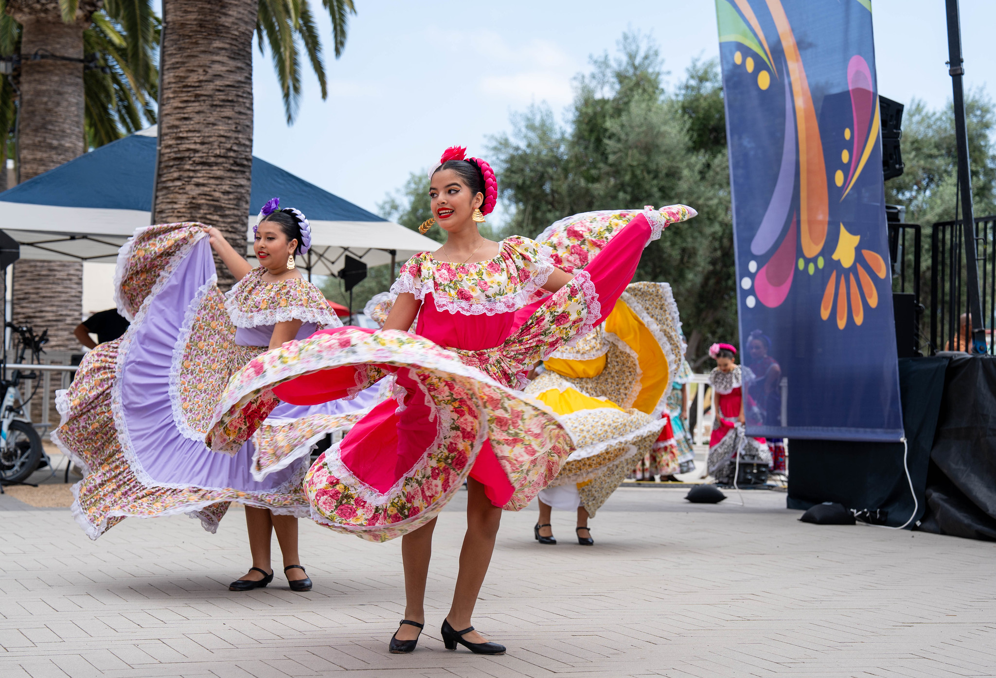 Women dancing in traditional Latin American dance. 
