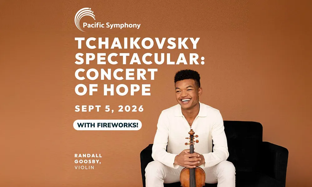 Graphic: Smiling Randall Goosby with violin, promoting Pacific Symphony concert.