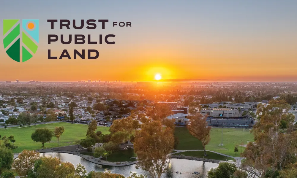Trust for Public Land logo. Irvine ranked #2 Park System in the Nation; sunset over park.