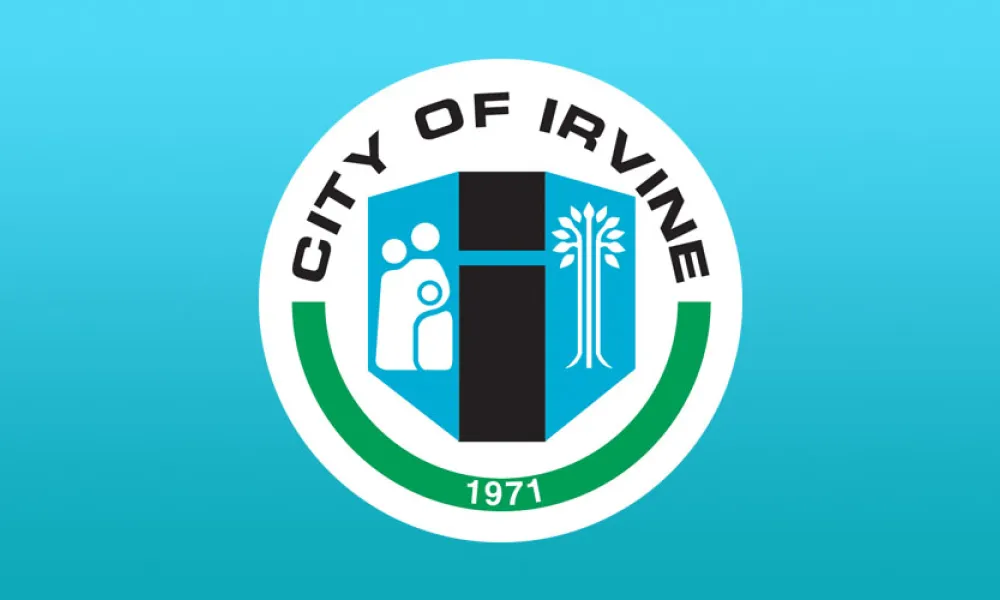 Cityof Irvine logo against an aqua blue background