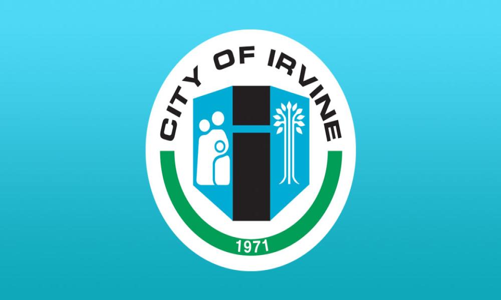 City of Irvine flag: light blue, central logo with family, tree, and "CITY OF IRVINE 1971".