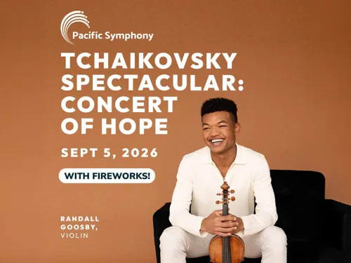 Graphic: Smiling Randall Goosby with violin, promoting Pacific Symphony concert.